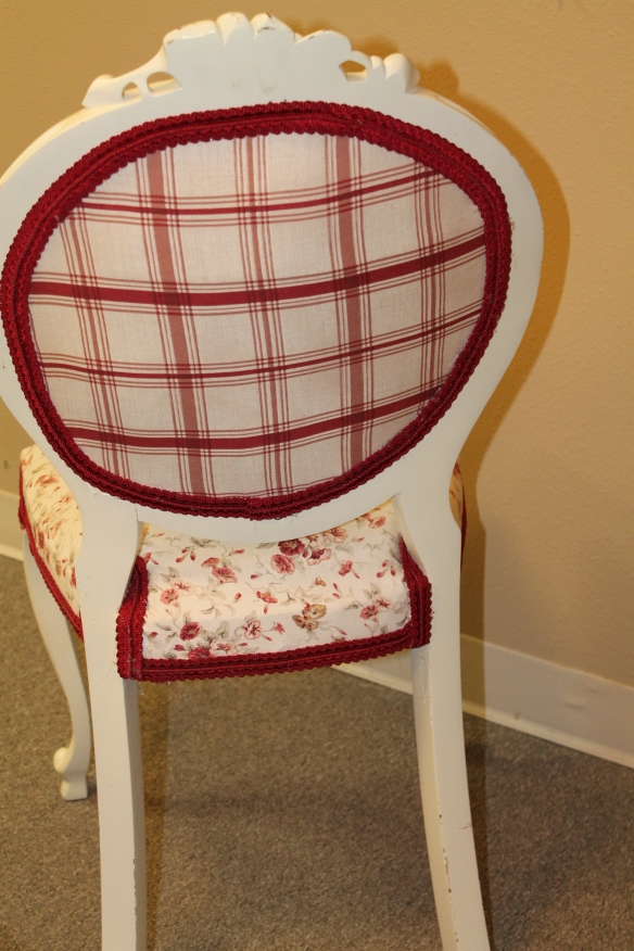 red chair reupholstered back side